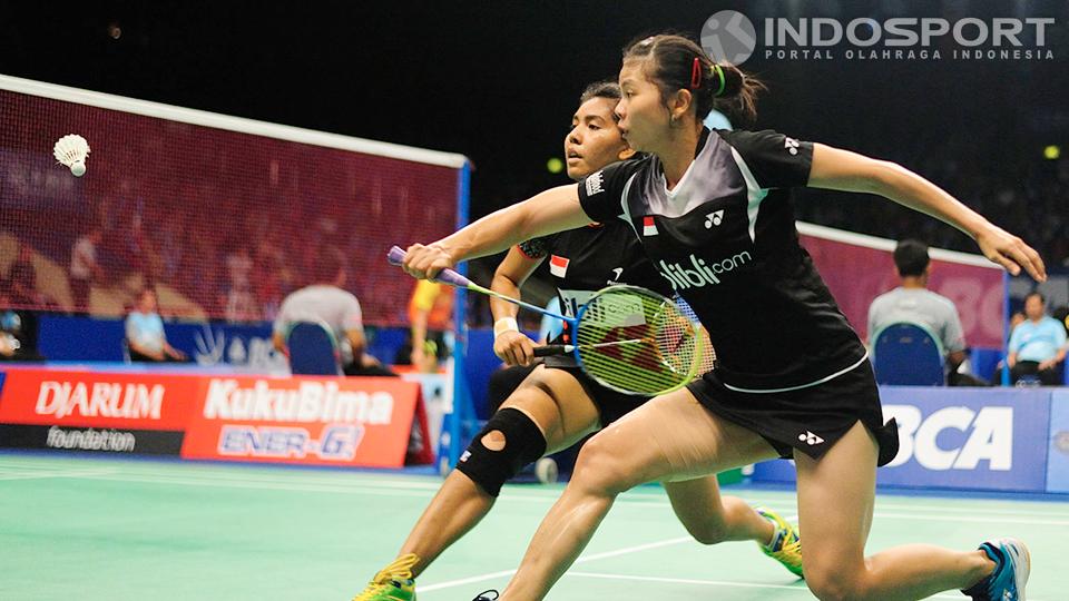 Nitya Krishinda Maheswari (kanan)/Greysia Polii saat bertanding di Indonesia Open 2014. - INDOSPORT